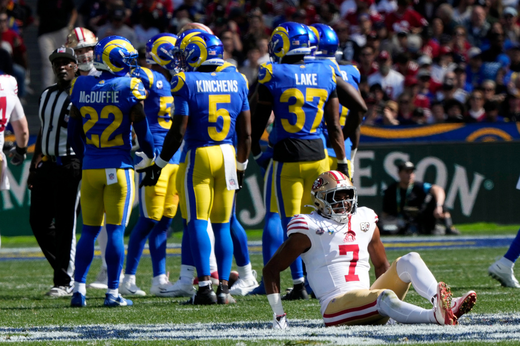 San Francisco 49ers wide receiver De'zhaun Stribling (7) sits on the field after being injured in the first half of an NFL football game against the Los Angeles Rams in Melbourne, Australia, Friday, Sept. 11, 2026. (AP Photo/Doug Benc)