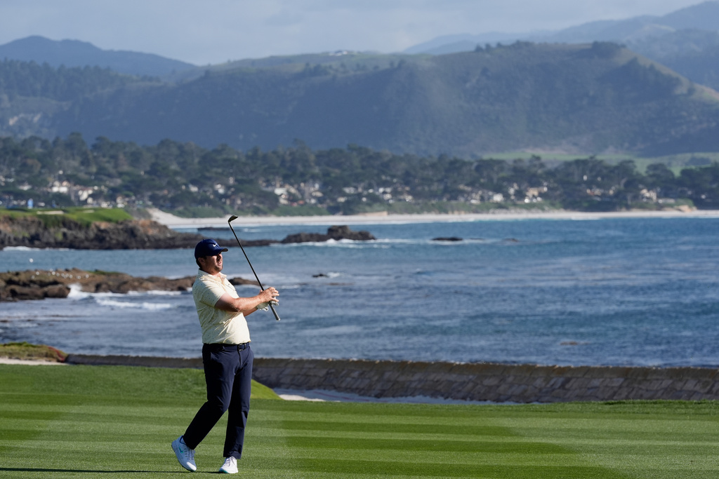 Chris Gotterup hits from the 18th fairway at Pebble Beach Golf Links during the first round of the AT&T Pebble Beach Pro-Am golf tournament in Pebble Beach, Calif., Thursday, Feb. 12, 2026. (AP Photo/Godofredo A. Vásquez)