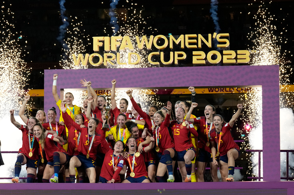 FILE - Team Spain celebrates with the trophy after winning the Women's World Cup soccer final against England at Stadium Australia in Sydney, Australia, August 20, 2023. (AP Photo/Alessandra Tarantino, File)