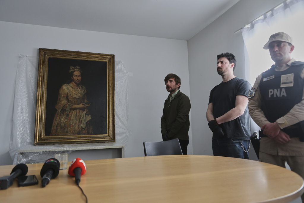 Giuseppe Ghislandi's 18th-century painting "Portrait of a Lady," reportedly stolen by a Nazi officer during World War II and discovered in the home of his daughter after appearing in a real estate listing, is displayed during a press conference by Prosecutor Daniel Adler in Mar del Plata, Argentina, Wednesday, Sept. 3, 2025. (AP Photo/Christian Heit)