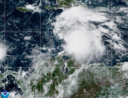 This NOAA satellite image taken at 11:40 a.m. EST on Tuesday, Oct. 21, 2025, shows Tropical Storm Melissa in the Central Caribbean Sea. (NOAA via AP) This NOAA satellite image taken at 11:40 a.m. EST on Tuesday, Oct. 21, 2025, shows Tropical Storm Melissa in the Central Caribbean Sea. (NOAA via AP)