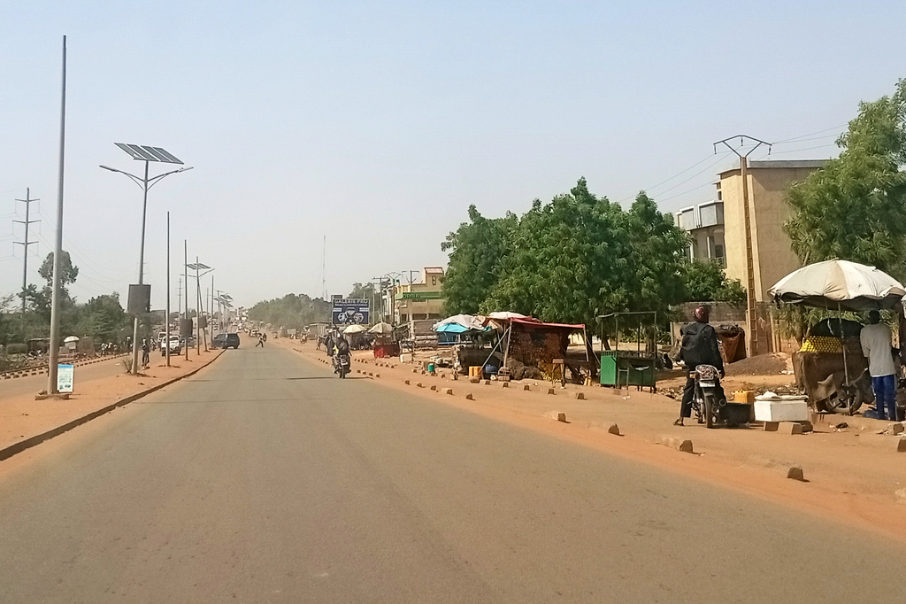 FILE - Motorcyclist ride along a street in Niamey, Niger, Thursday, June 18, 2026. (AP Photo, file)