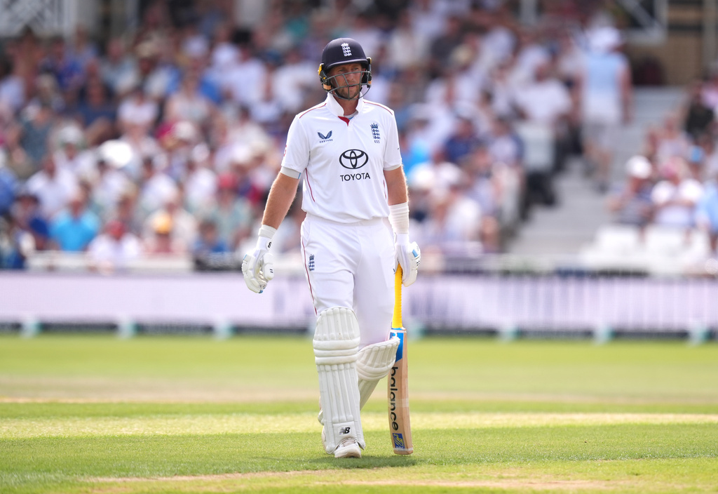England's Joe Root walks off the field after being bowled out by New Zealand's Nathan Smith via lbw during day three of the Third Test cricket match between England and New Zealand, in Nottingham, England, Saturday June 27, 2026. (Mike Egerton/PA via AP)