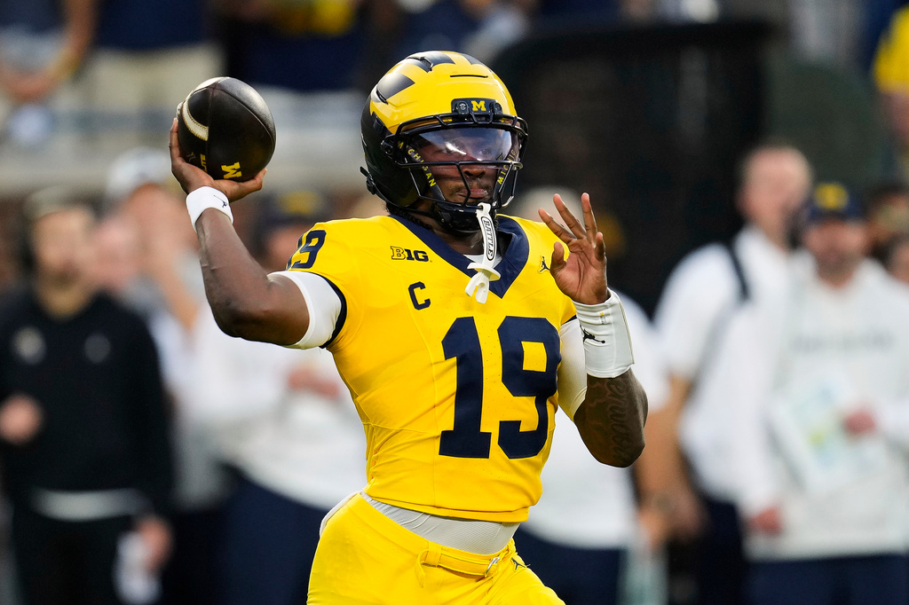Michigan quarterback Bryce Underwood throws against Western Michigan during the first half of an NCAA college football game Saturday, Sept. 5, 2026, in Ann Arbor, Mich. (AP Photo/Paul Sancya)