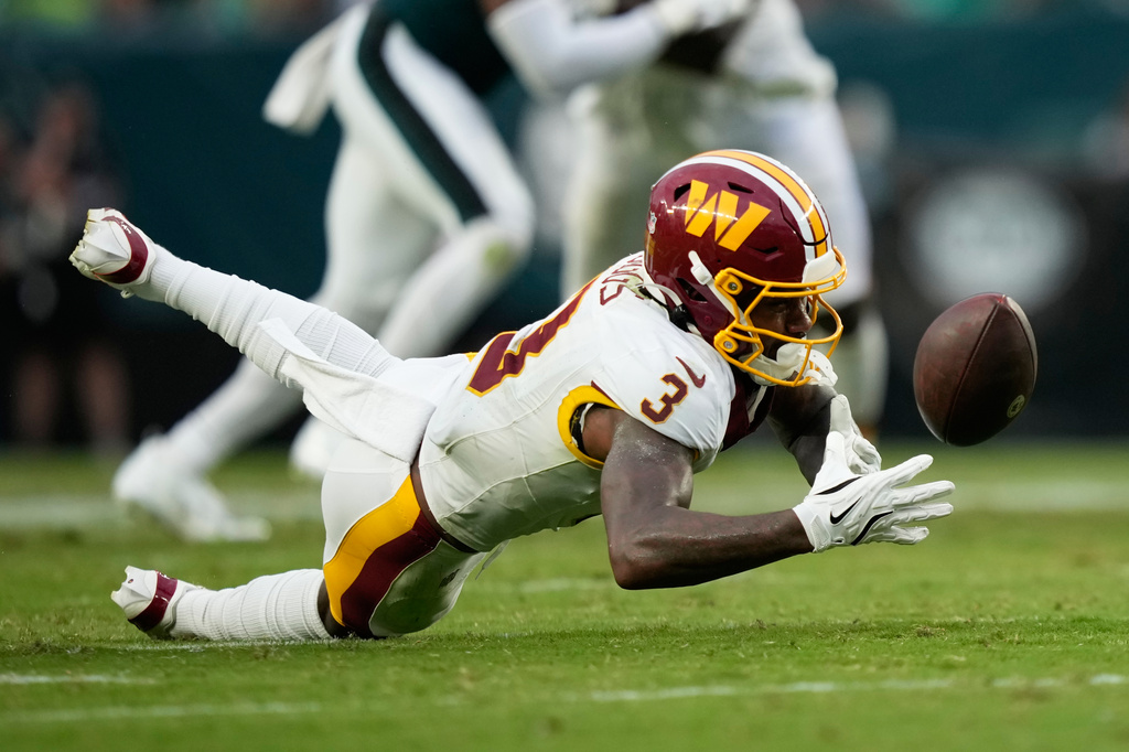 Washington Commanders wide receiver Stefon Diggs (3) fails to catch a pass during the second half of an NFL football game against the Philadelphia Eagles, Sunday, Sept. 13, 2026, in Philadelphia. (AP Photo/Matt Slocum)
