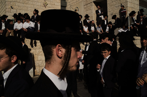 Ultra-Orthodox Jewish men gather for a rally against plans to force them to serve in the Israeli military, in Jerusalem, Thursday, Oct. 30, 2025. (AP Photo/Leo Correa) Ultra-Orthodox Jewish men gather for a rally against plans to force them to serve in the Israeli military, in Jerusalem, Thursday, Oct. 30, 2025. (AP Photo/Leo Correa)