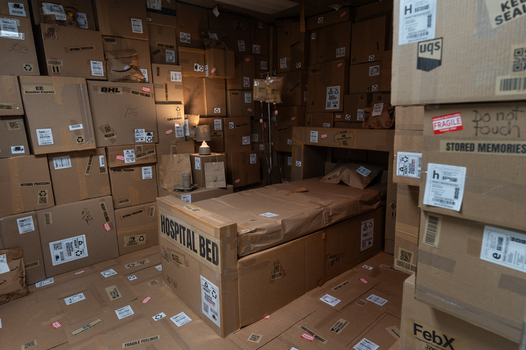 The installation "Delivered" by artist Heriberto Gomes is displayed during the "Hospital of Emotions" exhibition inside a former hospital building in Los Angeles, Wednesday, July 22, 2026. (AP Photo/Jae C. Hong)