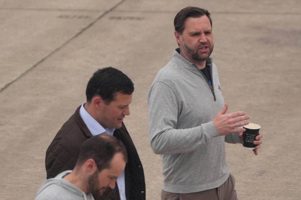 Vice President JD Vance walking on the tarmac for a planned refueling stop in Ramstein Air Base in Germany, Sunday, April 12, 2026, after attending talks on Iran. (AP Photo/Jacquelyn Martin, pool)