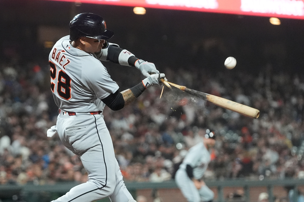 Detroit Tigers' Javier Báez breaks his bat while flying out during the sixth inning of a baseball game against the San Francisco Giants, Friday, Aug. 7, 2026, in San Francisco. (AP Photo/Jeff Chiu)