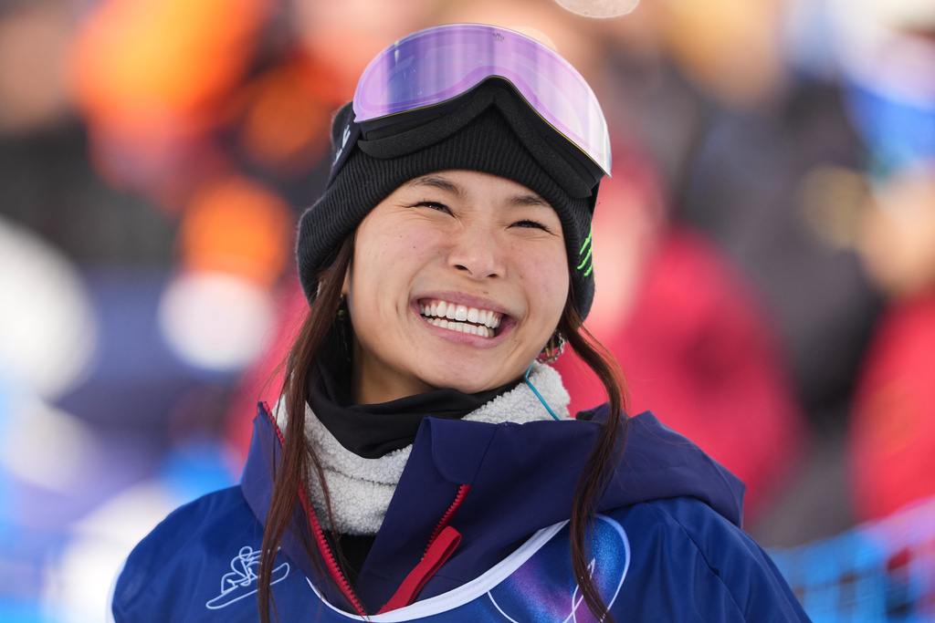 United States' Chloe Kim reacts to her score during the women's snowboarding halfpipe qualifications at the 2026 Winter Olympics, in Livigno, Italy, Wednesday, Feb. 11, 2026. (AP Photo/Lindsey Wasson)