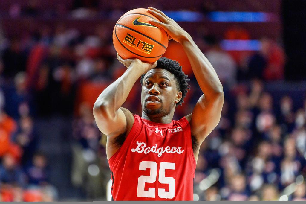 FILE - Wisconsin's John Blackwell shoots during the second half of an NCAA college basketball game against Illinois, Feb. 10, 2026, in Champaign, Ill. (AP Photo/Craig Pessman, File)
