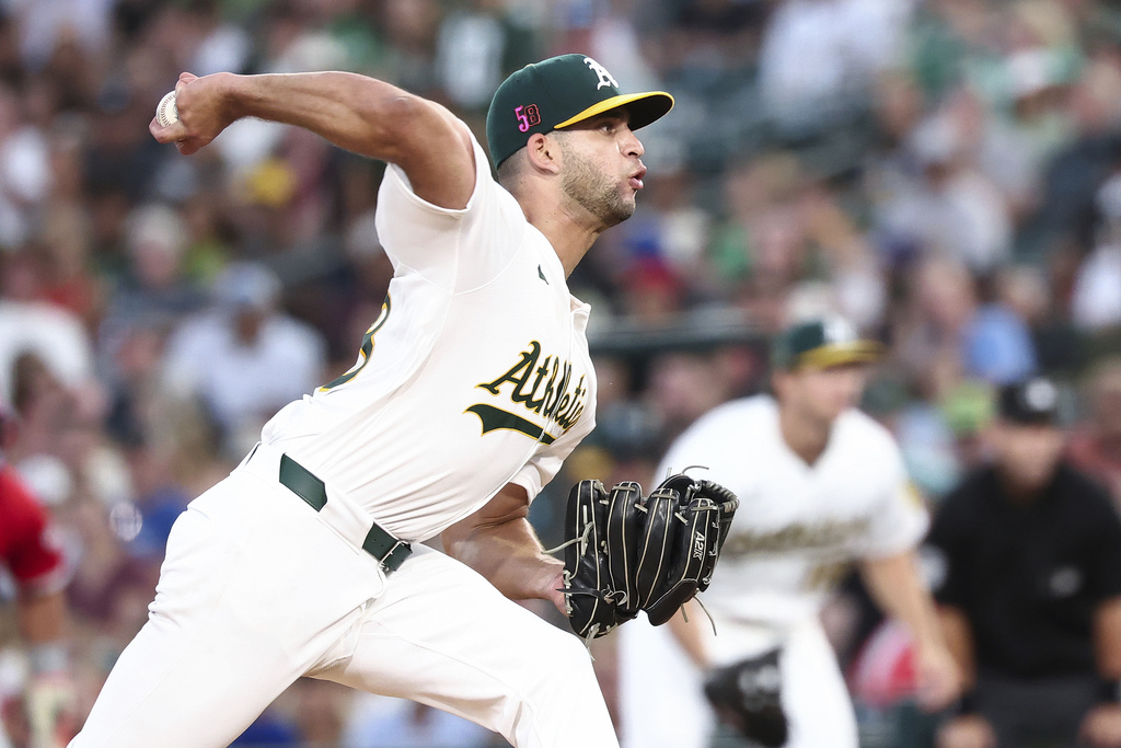 Athletics pitcher Luis Morales delivers to the Los Angeles Angels during the third inning of a baseball game Saturday, Aug. 16, 2025, in West Sacramento, Calif. (AP Photo/Sara Nevis)