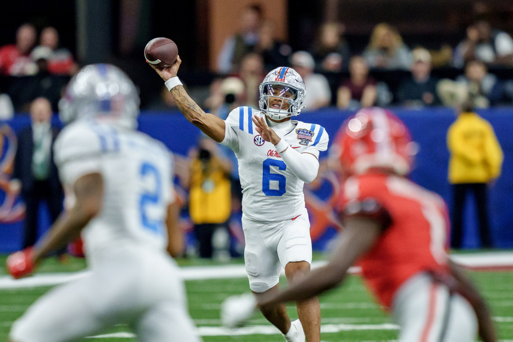 FILE - Mississippi quarterback Trinidad Chambliss (6) throws during the second half of the Sugar Bowl NCAA college football playoff quarterfinal game against Georgia on Jan. 1, 2026, in New Orleans. (AP Photo/Matthew Hinton, File)