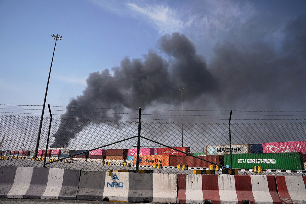 FILE - Smoke rises after an Iranian drone attack in the port area of Dubai, United Arab Emirates, March 1, 2026. (AP Photo/Fatima Shbair, File)