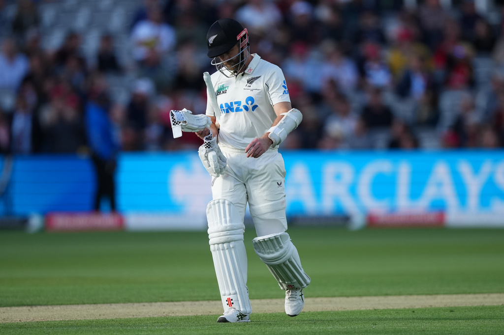 New Zealand's Kane Williamson leaves the pitch after losing his wicket during the second day of the test match between England and New Zealand at Lord's cricket ground in London, Friday, June 5, 2026. (AP Photo/Kirsty Wigglesworth)