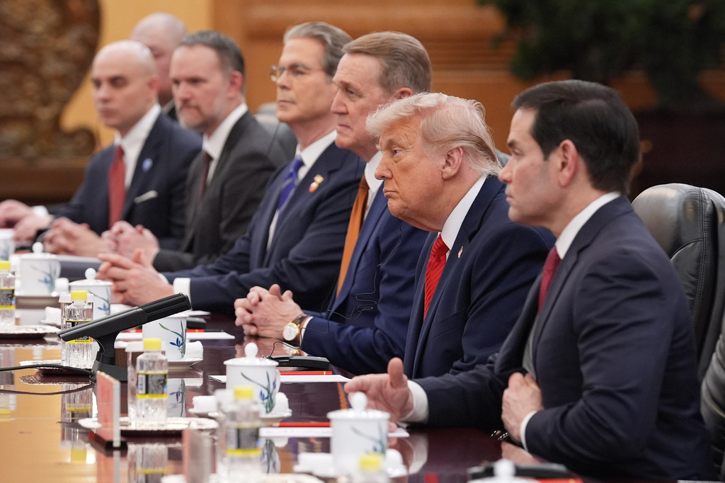 President Donald Trump listens as he meets with China's President Xi Jinping at the Great Hall of the People, Thursday, May 14, 2026, in Beijing. (AP Photo/Mark Schiefelbein)
