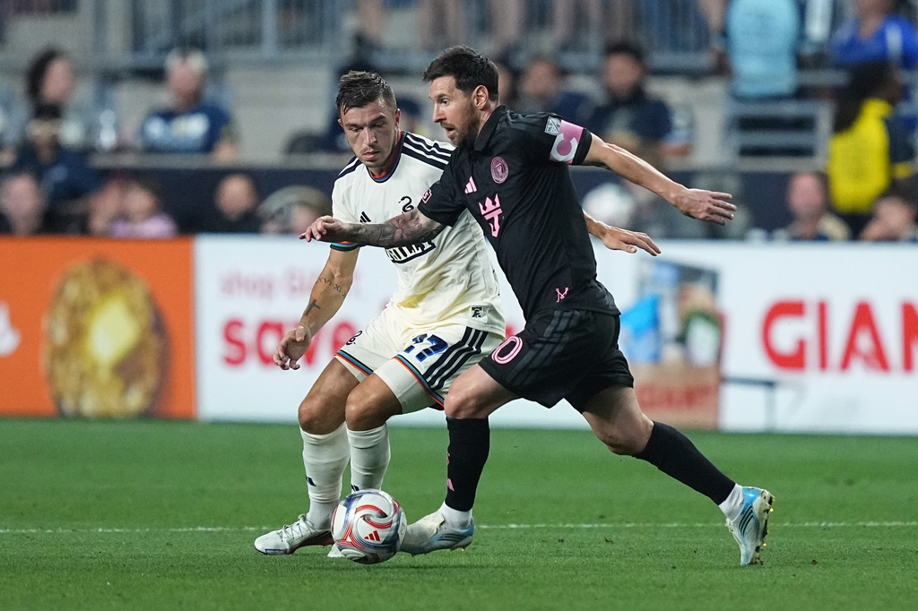 Inter Miami's Leo Messi, right, controls the ball under pressure from Philadelphia Union's Kai Wagner during the first half of an MLS soccer match, Wednesday, Aug. 19, 2026, in Chester, Pa. (AP Photo/Matt Rourke)