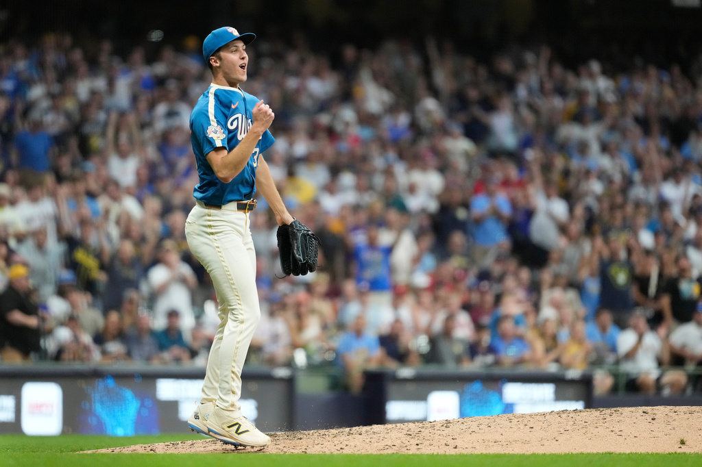 Milwaukee Brewers' Jacob Misiorowski reacts after striking out a Philadelphia Phillies batter during the eighth inning of a baseball game Friday, June 12, 2026, in Milwaukee. (AP Photo/Aaron Gash)