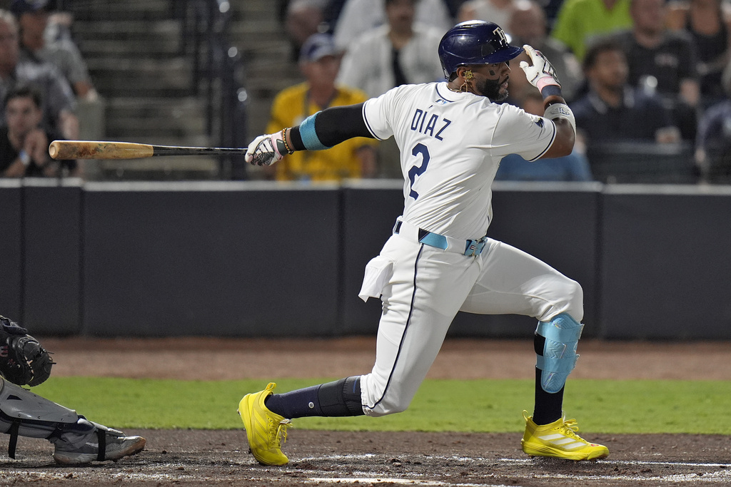 Tampa Bay Rays' Yandy Díaz (2) singles off Seattle Mariners pitcher George Kirby during the second inning of a baseball game Wednesday, Sept. 3, 2025, in Tampa, Fla. (AP Photo/Chris O'Meara)