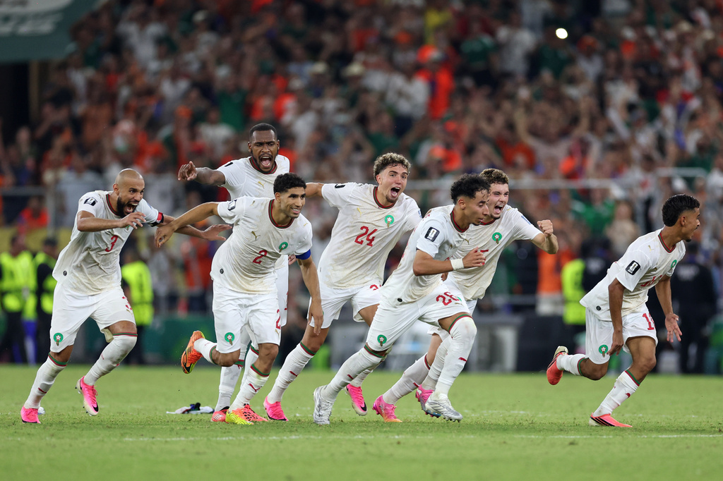The Moroccan team starts to celebrate after winning on penalty kicks the World Cup round of 32 soccer match between the Netherlands and Morocco in Guadalupe, near Monterrey, Mexico, Monday, June 29, 2026. (AP Photo/Sofia Yaker)