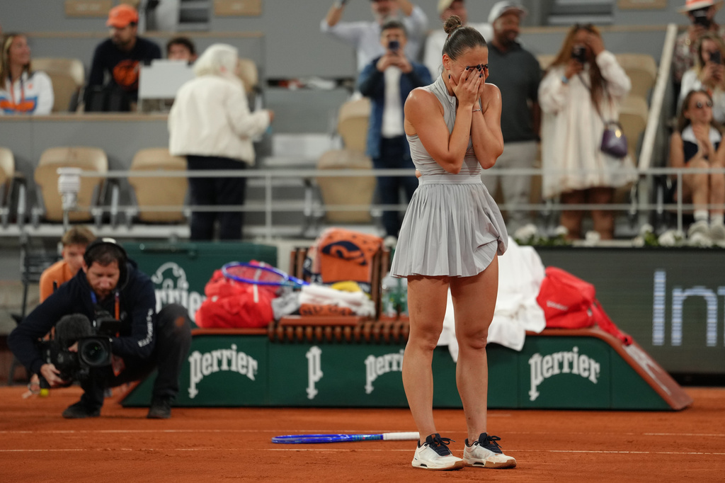 Ukraine's Marta Kostyuk reacts after winning the quarterfinal tennis match against Ukraine's Elina Svitolina at the French Open in Paris, Tuesday, June 2, 2026. (AP Photo/Aurelien Morissard)