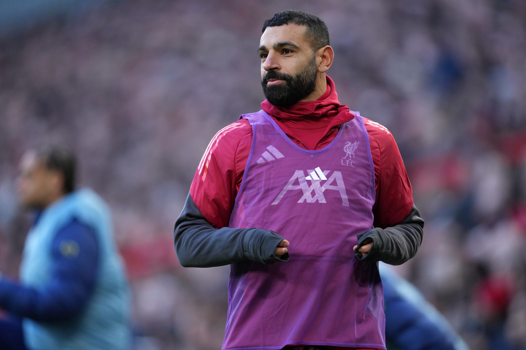 Liverpool's Mohamed Salah warms up during the Premier League soccer match between Liverpool and Tottenham in Liverpool, England, Sunday, March 15, 2026. (AP Photo/Jon Super)