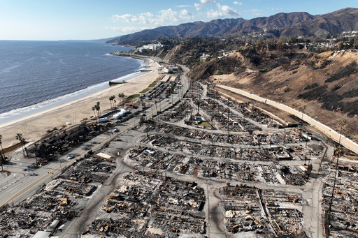 FILE - An aerial view shows the devastation left by the Palisades Fire in the Pacific Palisades section of Los Angeles, Jan. 27, 2025. (AP Photo/Jae C. Hong, file) FILE - An aerial view shows the devastation left by the Palisades Fire in the Pacific Palisades section of Los Angeles, Jan. 27, 2025. (AP Photo/Jae C. Hong, file)