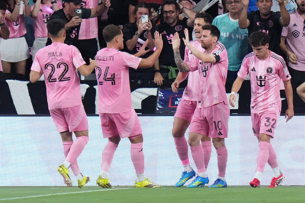 Inter Miami CF forward Lionel Messi, second from right, celebrates after scoring a goal during the first half of an MLS soccer match against Austin FC, Saturday, April 4, 2026, in Miami. (AP Photo/Lynne Sladky)