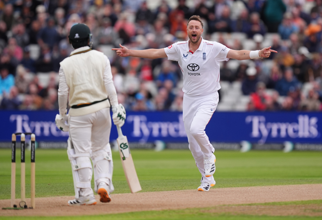 England's Ollie Robinson celebrates the wicket of Pakistan's Saim Ayub on day two of the third cricket Test between England and Pakistan in Birmingham, England, Thursday Sept. 10, 2026. (Mike Egerton/PA via AP)