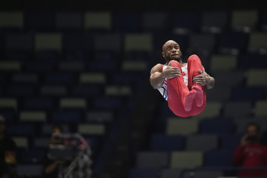 Donnell Whittenburg of EVO Gymnastics competes on the parallel bars during the senior men's finals of the U.S. Gymnastics Championships in New Orleans, Saturday, Aug. 9, 2025. (AP Photo/Gerald Herbert)