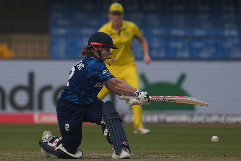 England's Tammy Beaumont plays a shot during the ICC Women's Cricket World Cup cricket match between England and Australia at Holkar Cricket Stadium in Indore, India, Wednesday, Oct. 22, 2025. (AP Photo/Rafiq Maqbool)