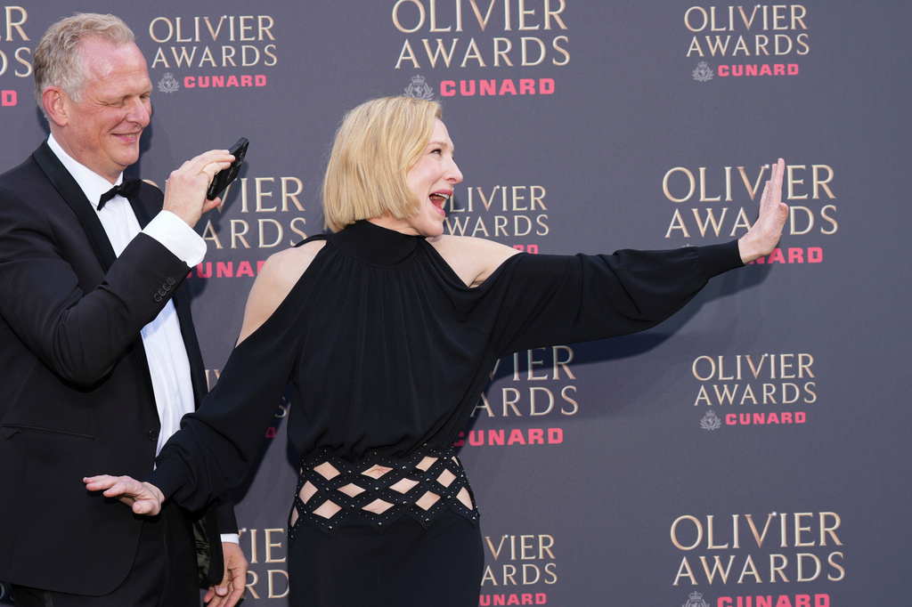 Cate Blanchett reacts as she poses for photographers upon arrival at the Olivier Awards in London, England, Sunday, April 12, 2026. (Photo by Scott A Garfitt/Invision/AP)