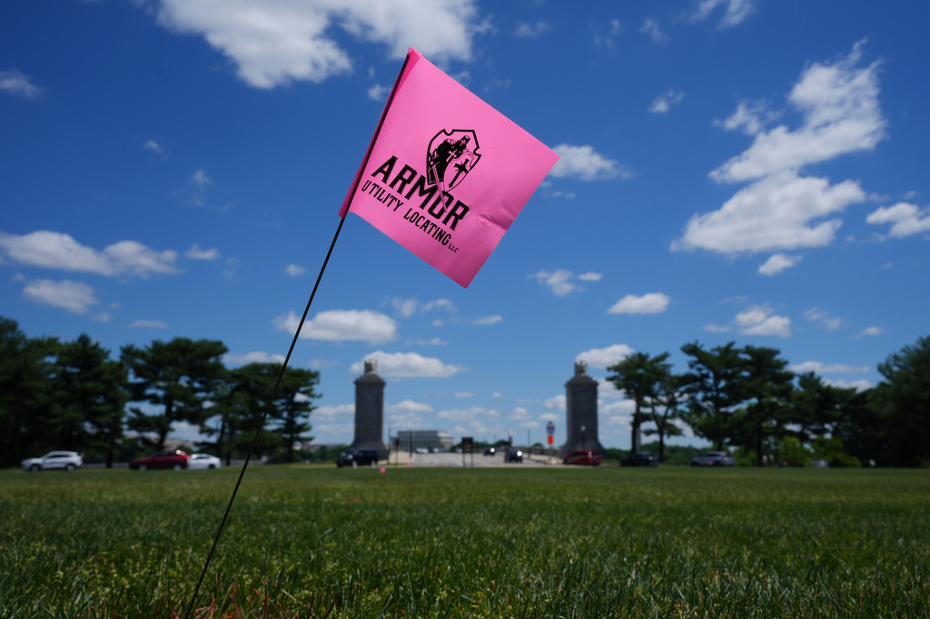 Flags placed by workers are pictured in the Memorial Circle, where President Donald Trump has proposed building an arch to commemorate the United States' 250th anniversary, Friday, May 15, 2026, in Washington. (AP Photo/Jacquelyn Martin)