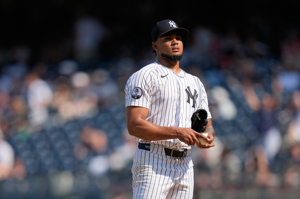 New York Yankees pitcher Camilo Doval reacts after walking in a run during the 11th inning of a baseball game Detroit Tigers Wednesday, July 1, 2026, in New York. (AP Photo/Frank Franklin II)