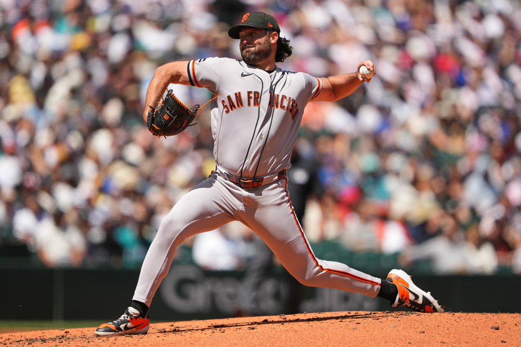 San Francisco Giants starting pitcher Robbie Ray throws against the Seattle Mariners during the second inning of a baseball game, Sunday, July 19, 2026, in Seattle. (AP Photo/Lindsey Wasson)