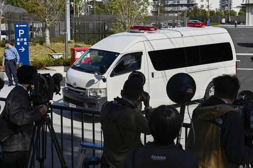 Journalists crowd as a vehicle which is belived to be carrying Tetsuya Yamagami, the accused killer of former Japanese Prime Minister Shinzo Abe, leaves a detention center in Osaka, western Japan for a trial Tuesday, Oct. 28, 2025. (Kyodo News via AP) Journalists crowd as a vehicle which is belived to be carrying Tetsuya Yamagami, the accused killer of former Japanese Prime Minister Shinzo Abe, leaves a detention center in Osaka, western Japan for a trial Tuesday, Oct. 28, 2025. (Kyodo News via AP)