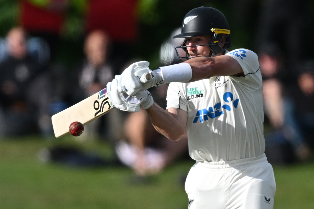 New Zealand's Nathan Smith bats against the West Indies during their cricket test match in Christchurch, New Zealand, Tuesday, Dec. 2, 2025. (Andrew Cornaga/Photosport via AP)