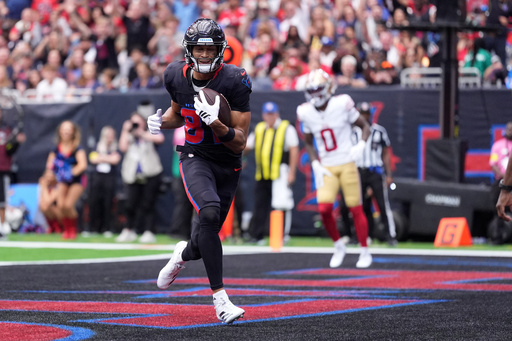 Houston Texans wide receiver Jayden Higgins catches a touchdown pass during the first half of an NFL football game against the San Francisco 49ers Sunday, Oct. 26, 2025, in Houston. (AP Photo/Eric Gay) Houston Texans wide receiver Jayden Higgins catches a touchdown pass during the first half of an NFL football game against the San Francisco 49ers Sunday, Oct. 26, 2025, in Houston. (AP Photo/Eric Gay)