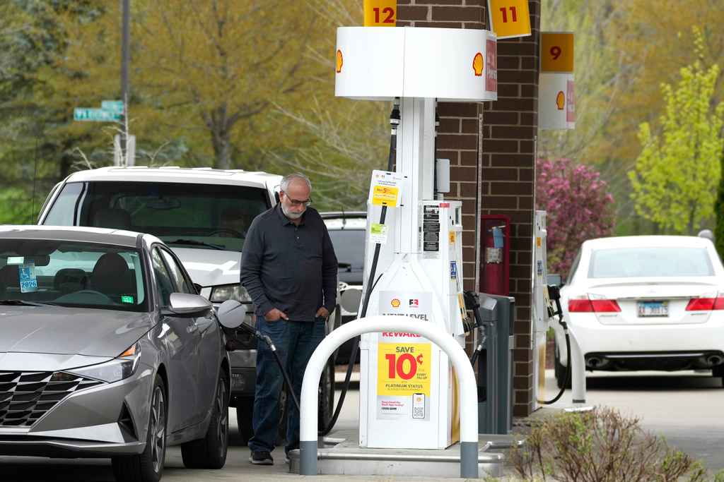 FILE - A customer fills up his vehicle's gas tank at a gas station in Buffalo Grove, Ill., April 23, 2024. (AP Photo/Nam Y. Huh, file)