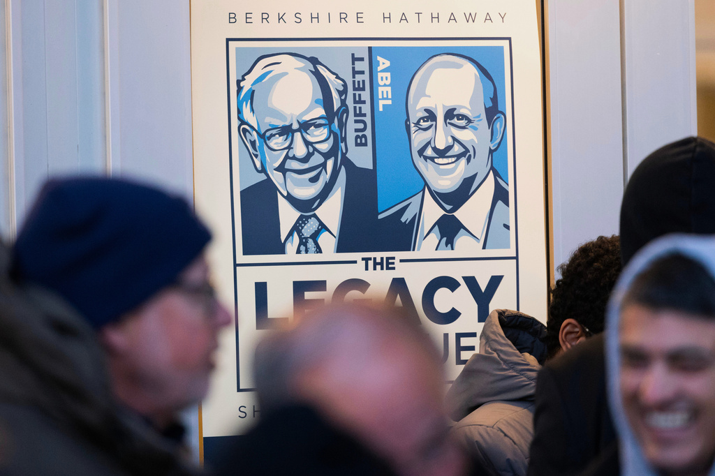 FILE - Shareholders wait in line outside CHI Health Center Omaha for the Berkshire Hathaway annual meeting, May 2, 2026, in Omaha, Neb. (AP Photo/Rebecca S. Gratz, File)