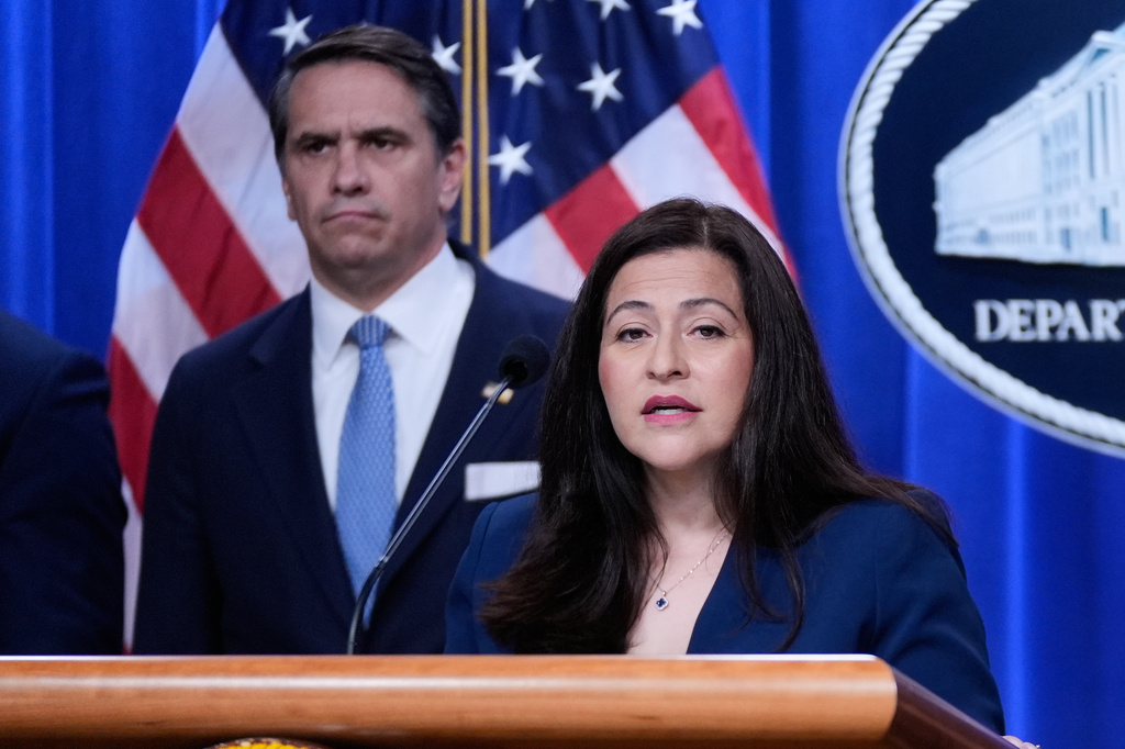 FILE - Acting Attorney General Todd Blanche listens as Angie Salazar, acting director of the Administration for Children and Families in the Office of Refugee Resettlement, speaks during a news conference on unaccompanied children at the Justice Department, June 11, 2026, in Washington. (AP Photo/Manuel Balce Ceneta, File)