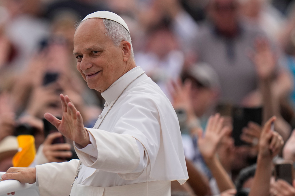 Pope Leo XIV arrives for his weekly general audience in St. Peter's Square, at the Vatican, Wednesday, May 13, 2026. (AP Photo/Alessandra Tarantino)