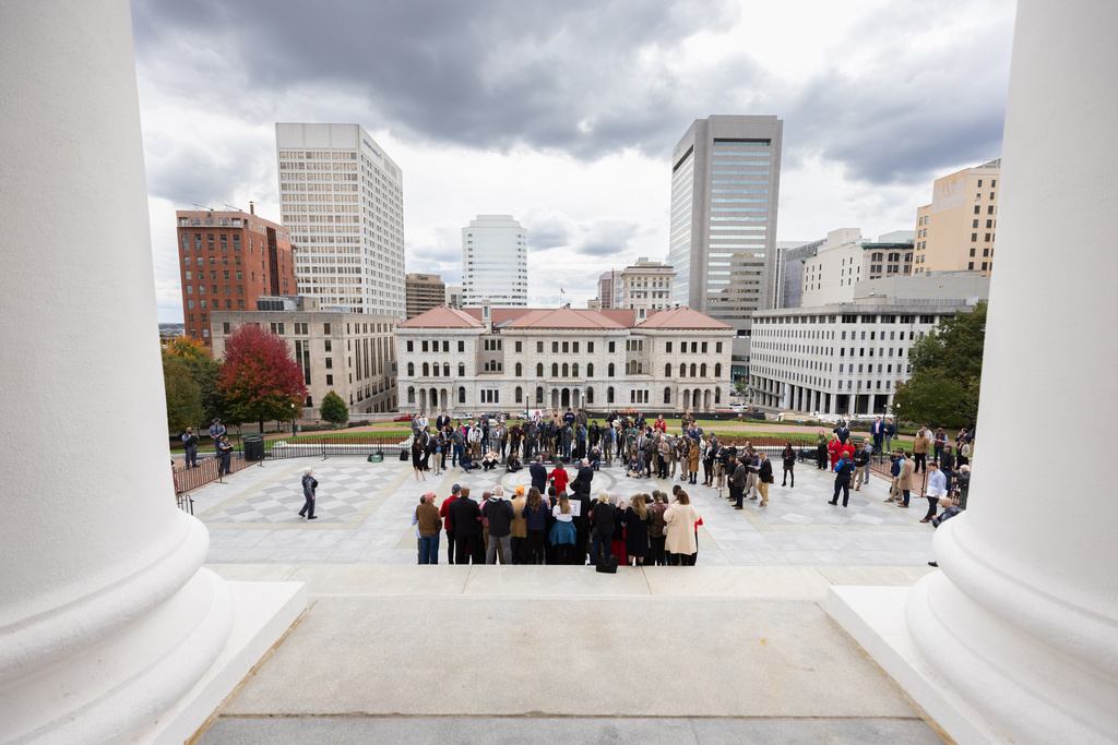 Republican gubernatorial candidate and current Lt. Gov. Winsome Earle-Sears speak during a news conference on the steps of the Virginia Capitol Building, Monday, Oct. 27, 2025, in Richmond, Va. (Mike Kropf/Richmond Times-Dispatch via AP)