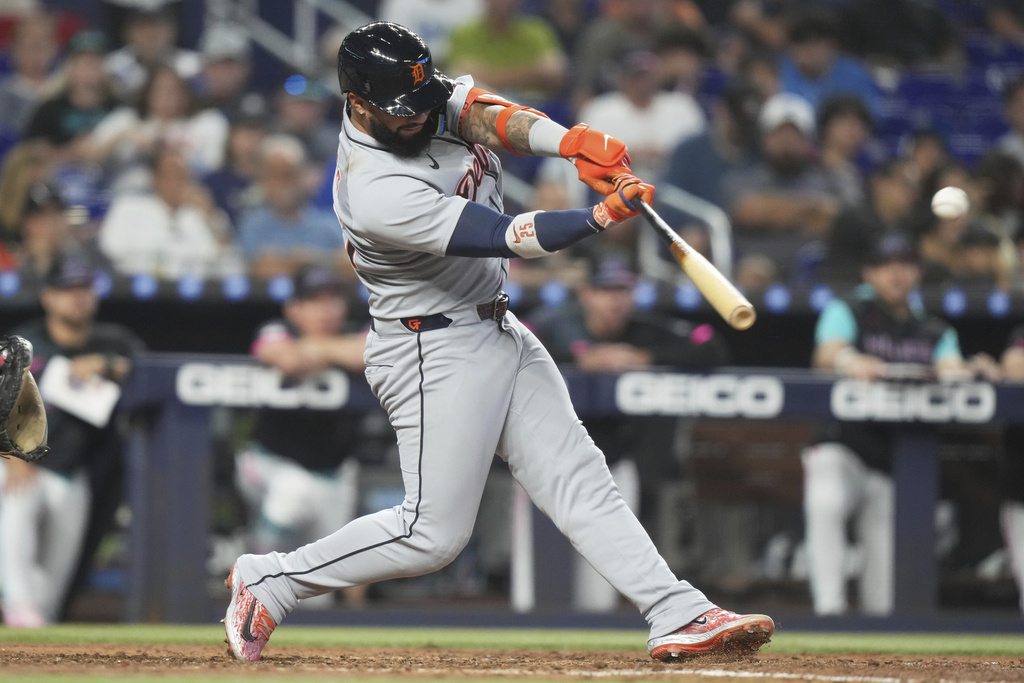 Detroit Tigers' Gleyber Torres hits a sacrifice fly to score Zach McKinstry during the fifth inning of a baseball game against the Miami Marlins, Saturday, Sept. 13, 2025, in Miami. (AP Photo/Lynne Sladky)