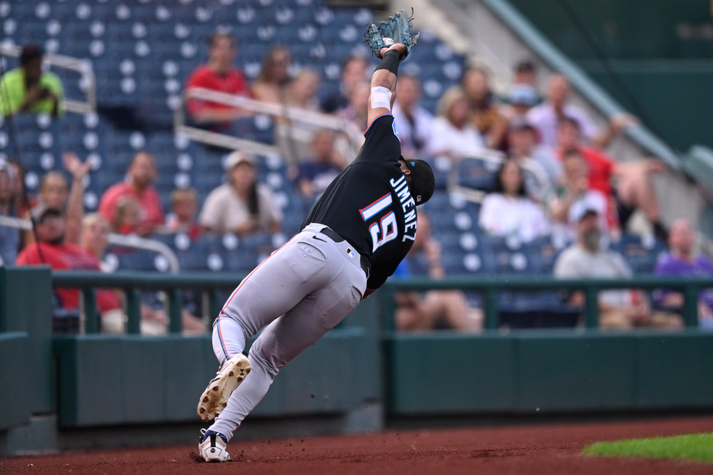 Miami Marlins third baseman Leo Jiménez catches a foul ball hit by Washington Nationals' Abimelec Ortiz during the first inning of a baseball game, Monday, Aug. 31, 2026, in Washington. (AP Photo/John McDonnell)