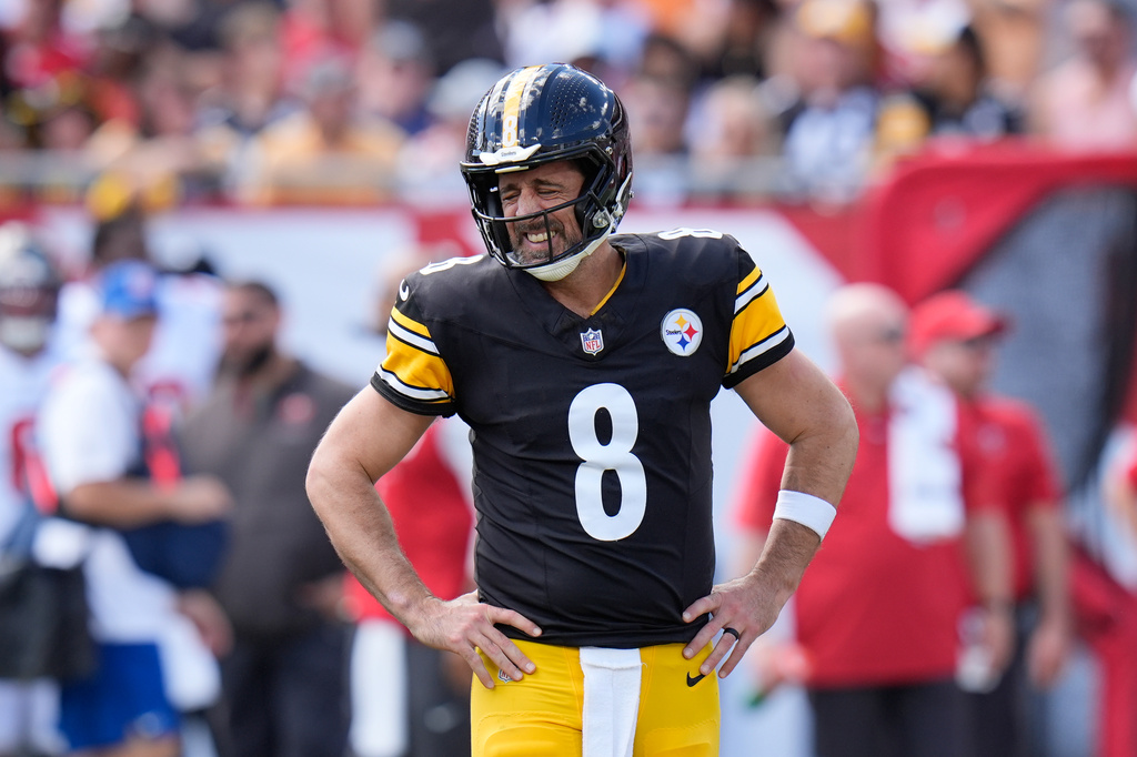 Pittsburgh Steelers quarterback Aaron Rodgers (8) grimaces after he was sacked during the first half of an NFL football game against the Tampa Bay Buccaneers in Tampa, Fla., Sunday, Oct. 18, 2026. (AP Photo/Chris O'Meara)
