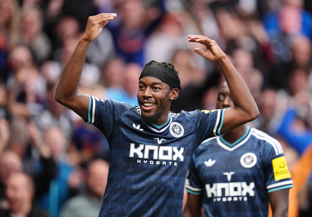 Newcastle United's Anthony Elanga celebrates scoring their side's first goal during the British Premier League soccer match between Newcastle United and Tottenham Hotspur, in London, Saturday Aug. 29, 2026. (John Walton/PA via AP)