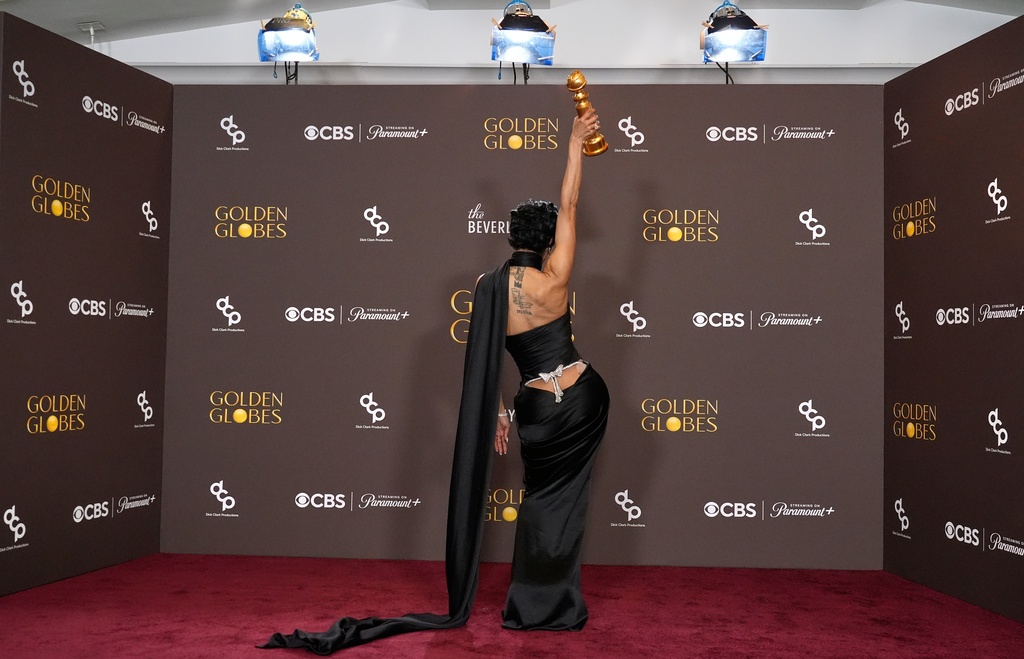 FILE - Teyana Taylor poses in the press room with the award for best performance by a female actor in a supporting role in any motion picture for "One Battle After Another" during the 83rd Golden Globes in Beverly Hills, Calif., on Jan. 11, 2026. (AP Photo/Chris Pizzello, File)