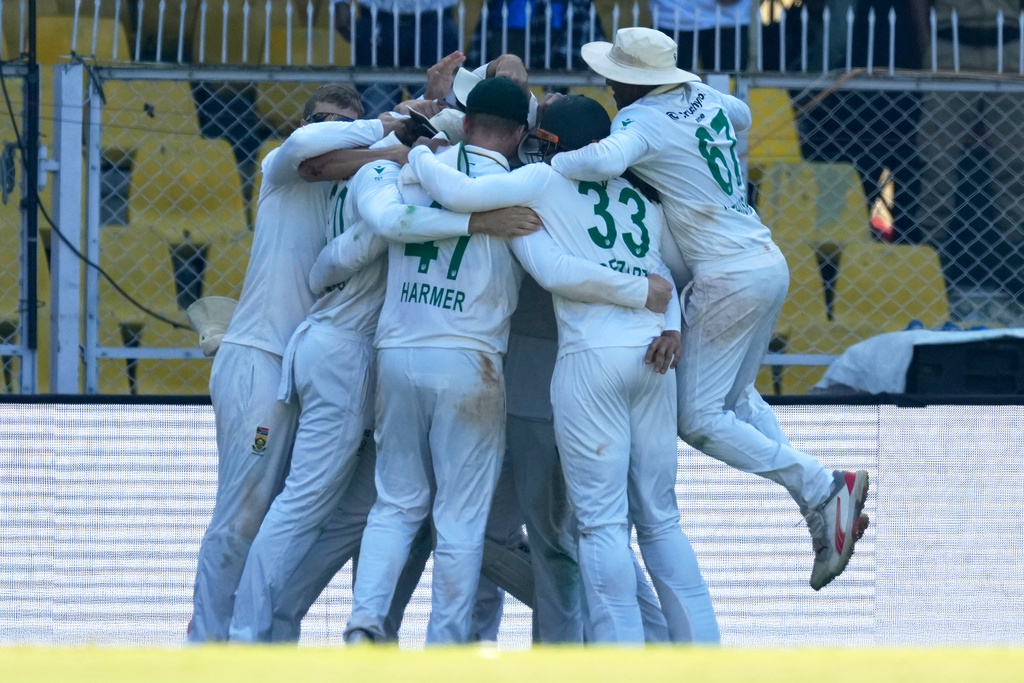 South Africa's players celebrate after South Africa wins the test series against India in Guwahati, India, Saturday, Nov. 22, 2025. (AP Photo/Anupam Nath)