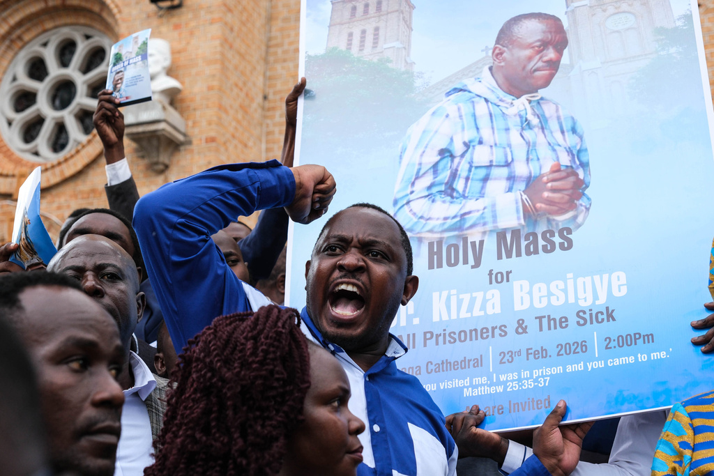 Supporters of detained Ugandan opposition figure Kizza Besigye gather for a prayer to press authorities to free him at Rubaga Cathedral in Kampala, Monday, Feb. 23, 2026. (AP Photo/Hajarah Nalwadda)